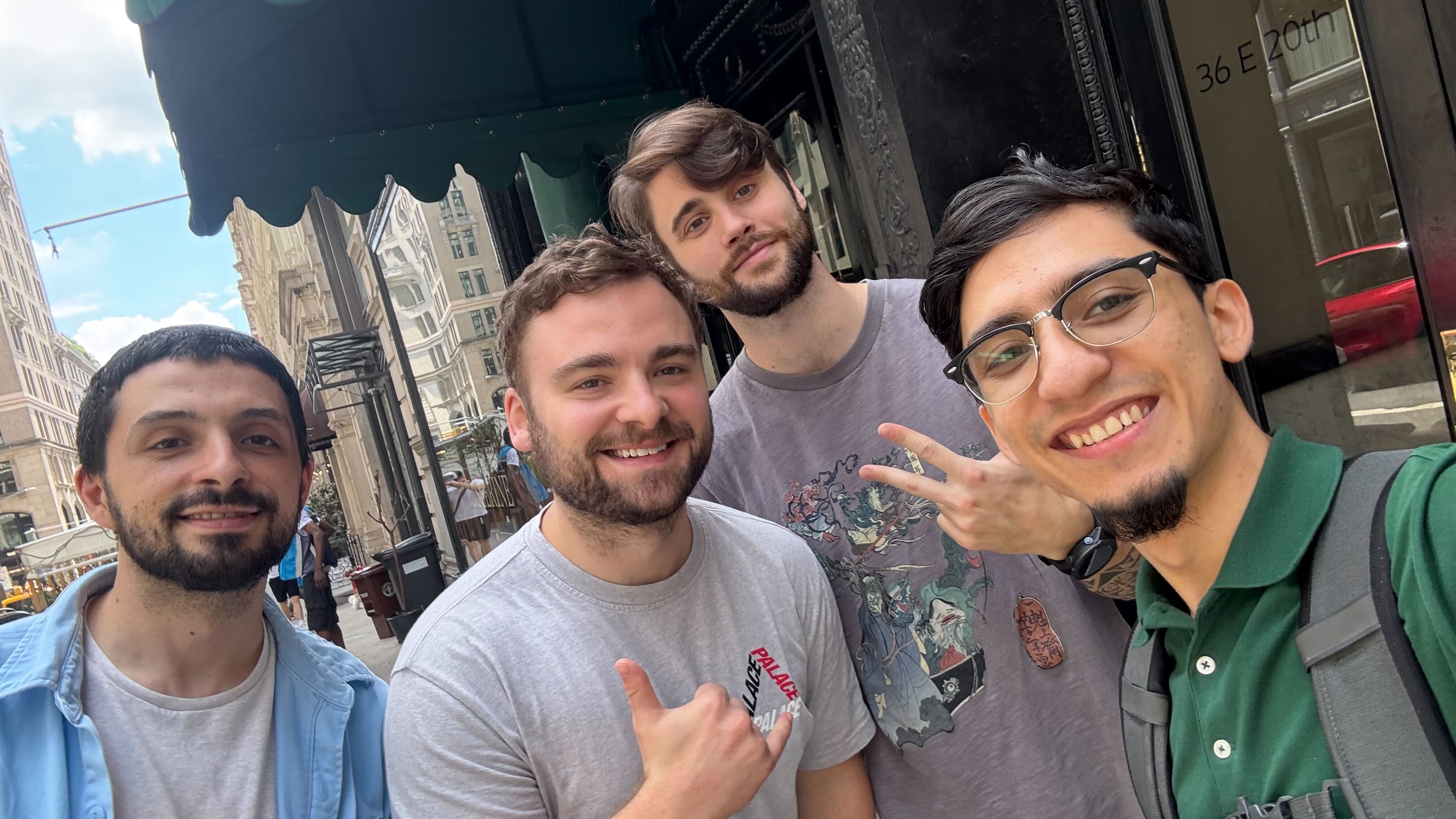 Small team gathering outside office